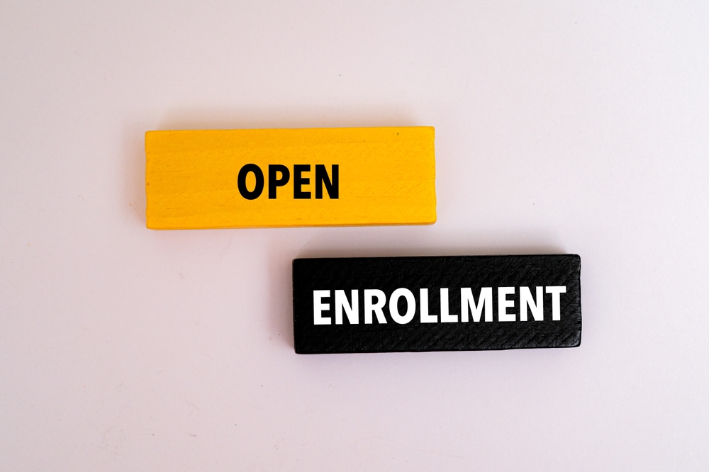 A,coloured,wooden,block,with,text,open,enrollment,on,it