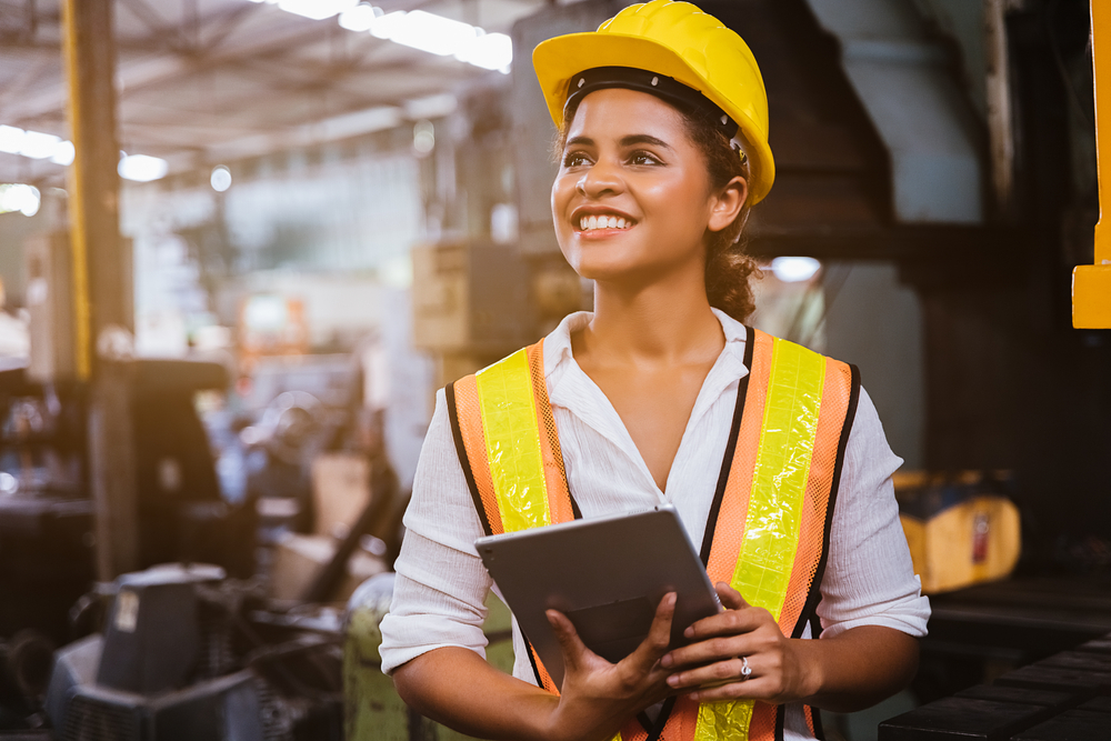 Industry,maintenance,engineer,woman,dark,skin,wearing,uniform,and,safety