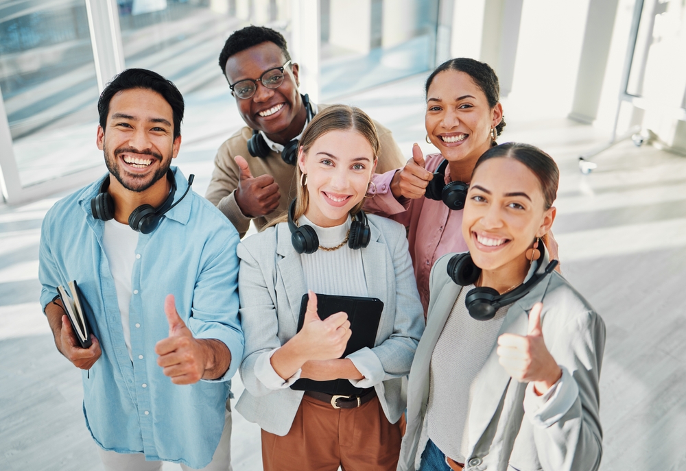 Business,,internship,and,portrait,of,people,with,thumbs,up,sign