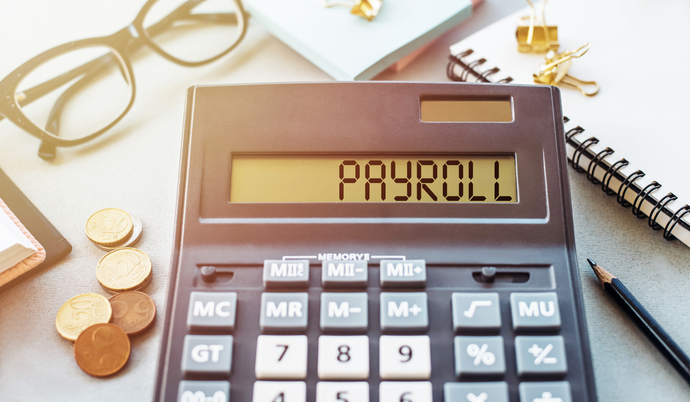 Payroll,word,written,on,calculator.,business,and,financial,concept
