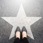 Success,in,business,design,concept.,businesswoman,standing,on,street,road